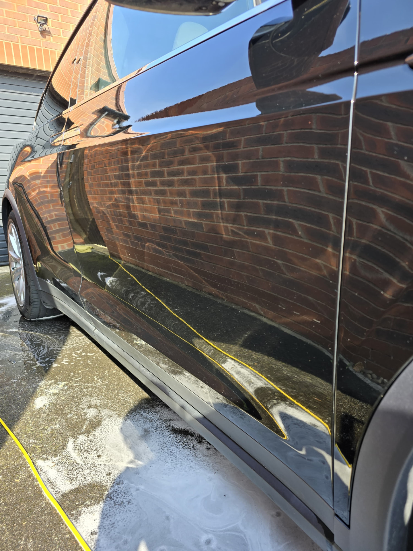 After: Paintwork transformation — dull and dusty to deep gloss